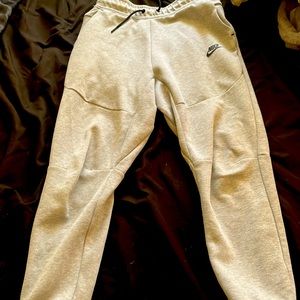 These are the nike tech sweats and they are fully in tact